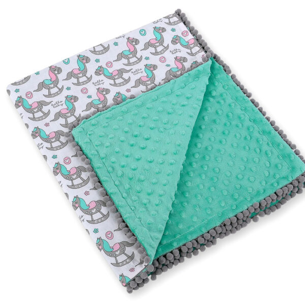 Dwustronny kocyk z pomponami minky i bawełna - koniki na biegunach